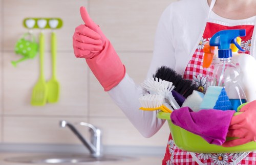 Local oven cleaner working in a compact NW3 kitchen